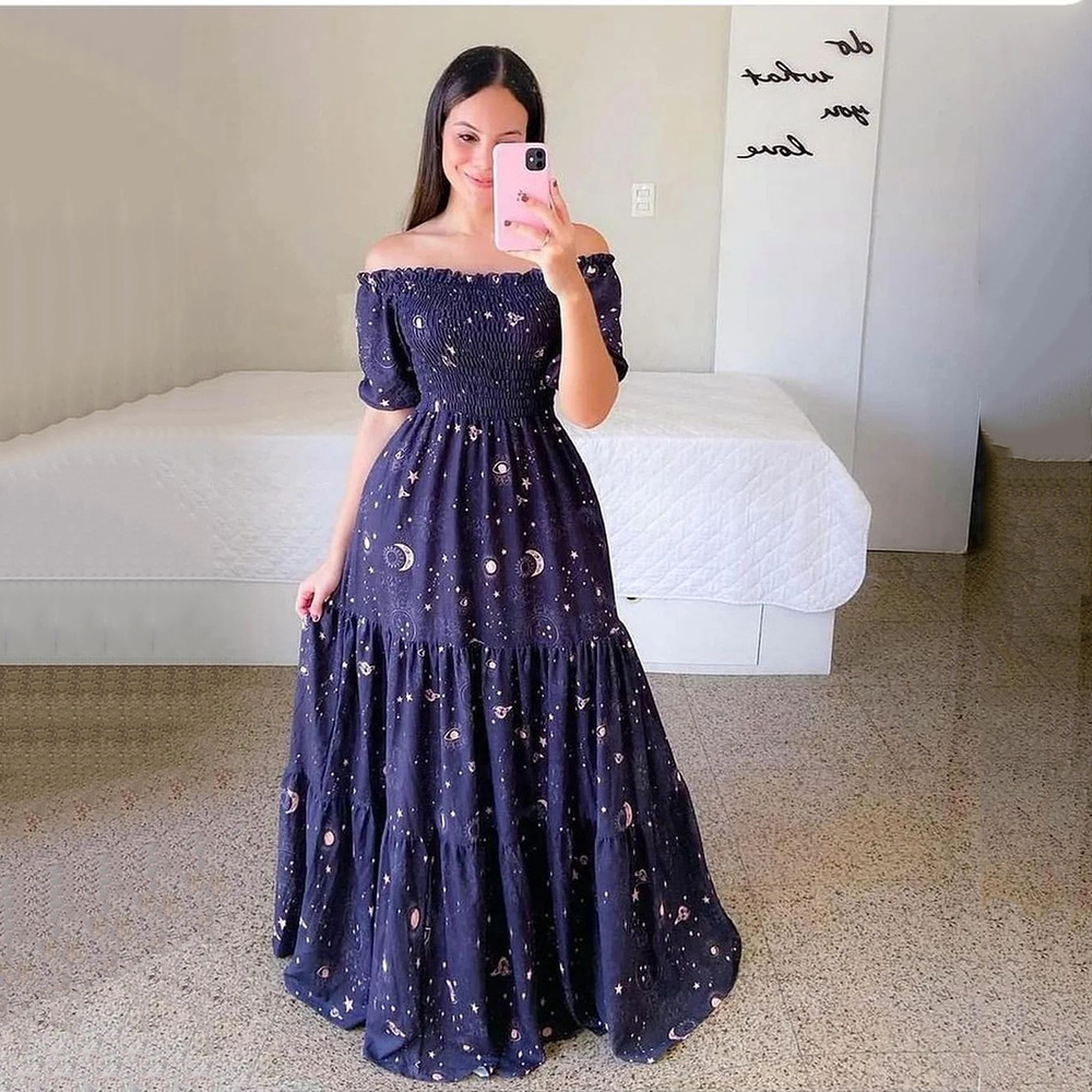 2023 nouvelle robe de belle fille hors de l'épaule déchiquetée mode hors de l'épaule longue robe imprimée