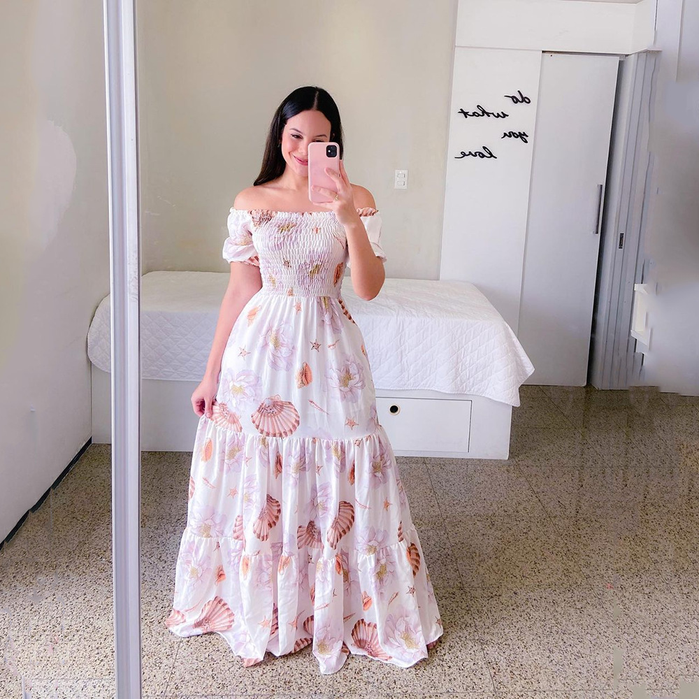 2023 nouvelle robe de belle fille hors de l'épaule déchiquetée mode hors de l'épaule longue robe imprimée