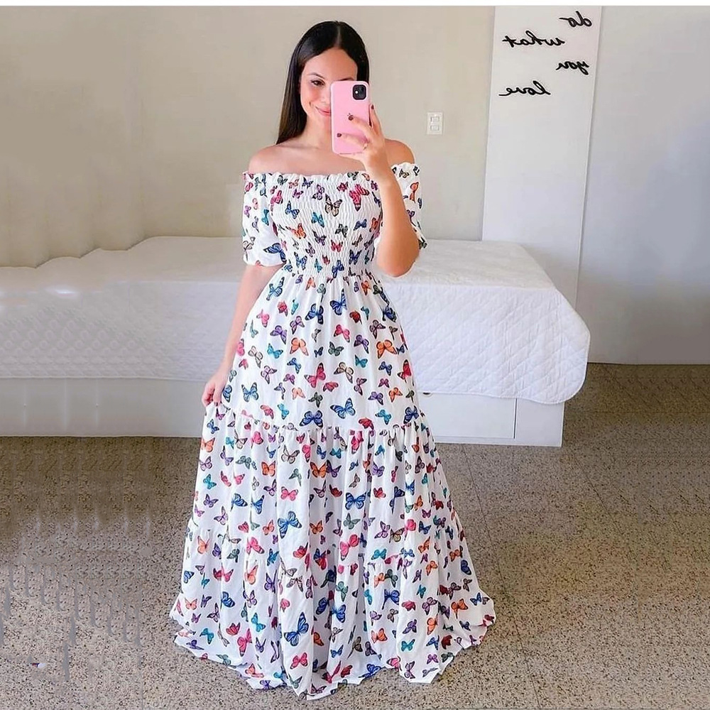 2023 nouvelle robe de belle fille hors de l'épaule déchiquetée mode hors de l'épaule longue robe imprimée