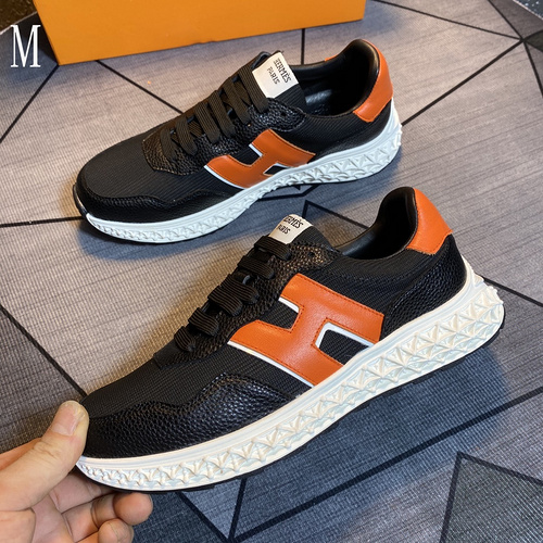 Hermes men's colorblock sneakers with textured calfskin details. Original cowhide upper and breathable mesh upper