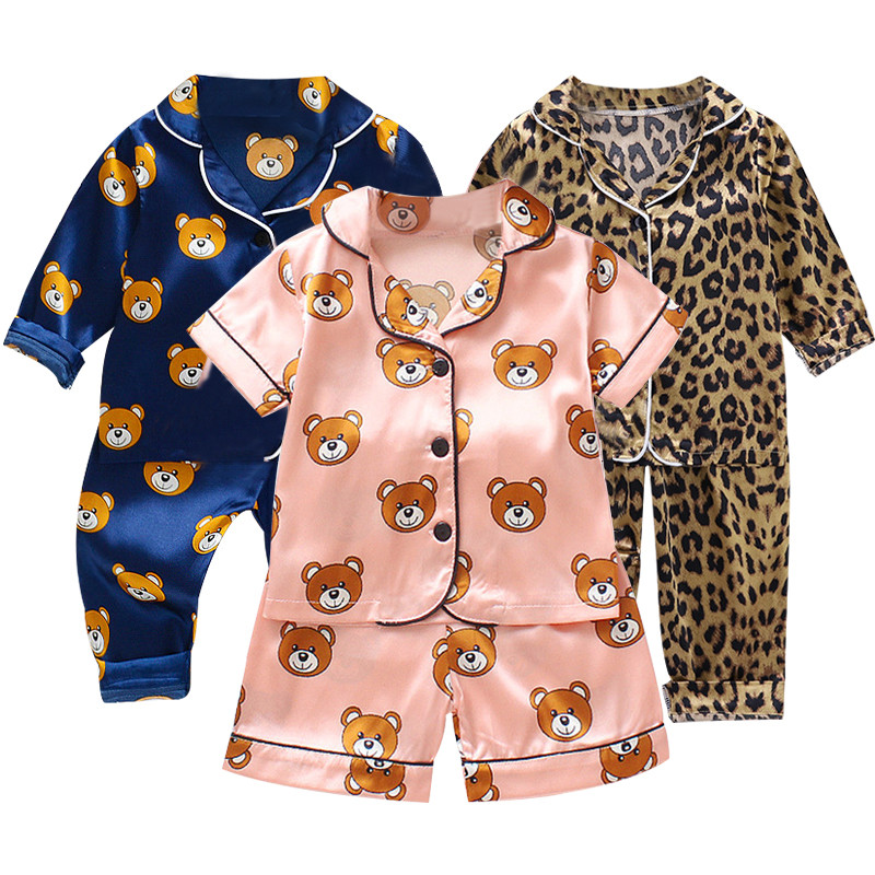 Children's pajamas suit boys and girls ice silk satin cartoon print home service single-breasted short-sleeved cover