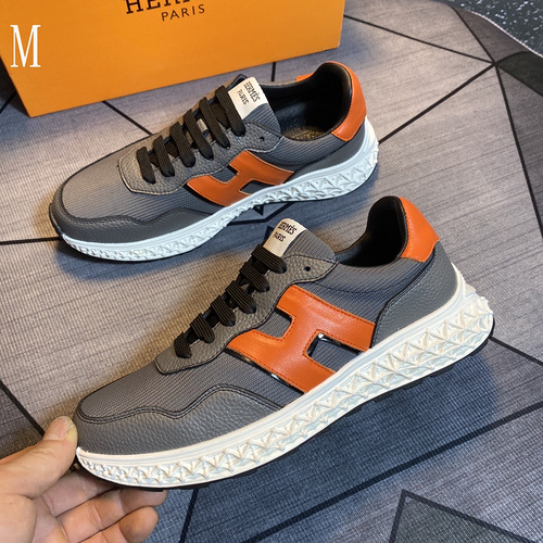 Hermes men's colorblock sneakers with textured calfskin details. Original cowhide upper and breathable mesh upper