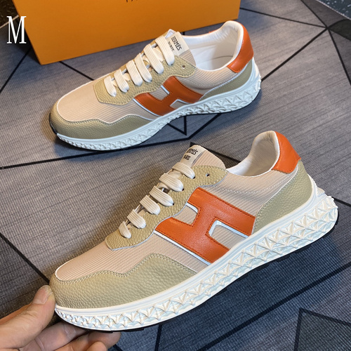 Hermes men's colorblock sneakers with textured calfskin details. Original cowhide upper and breathable mesh upper