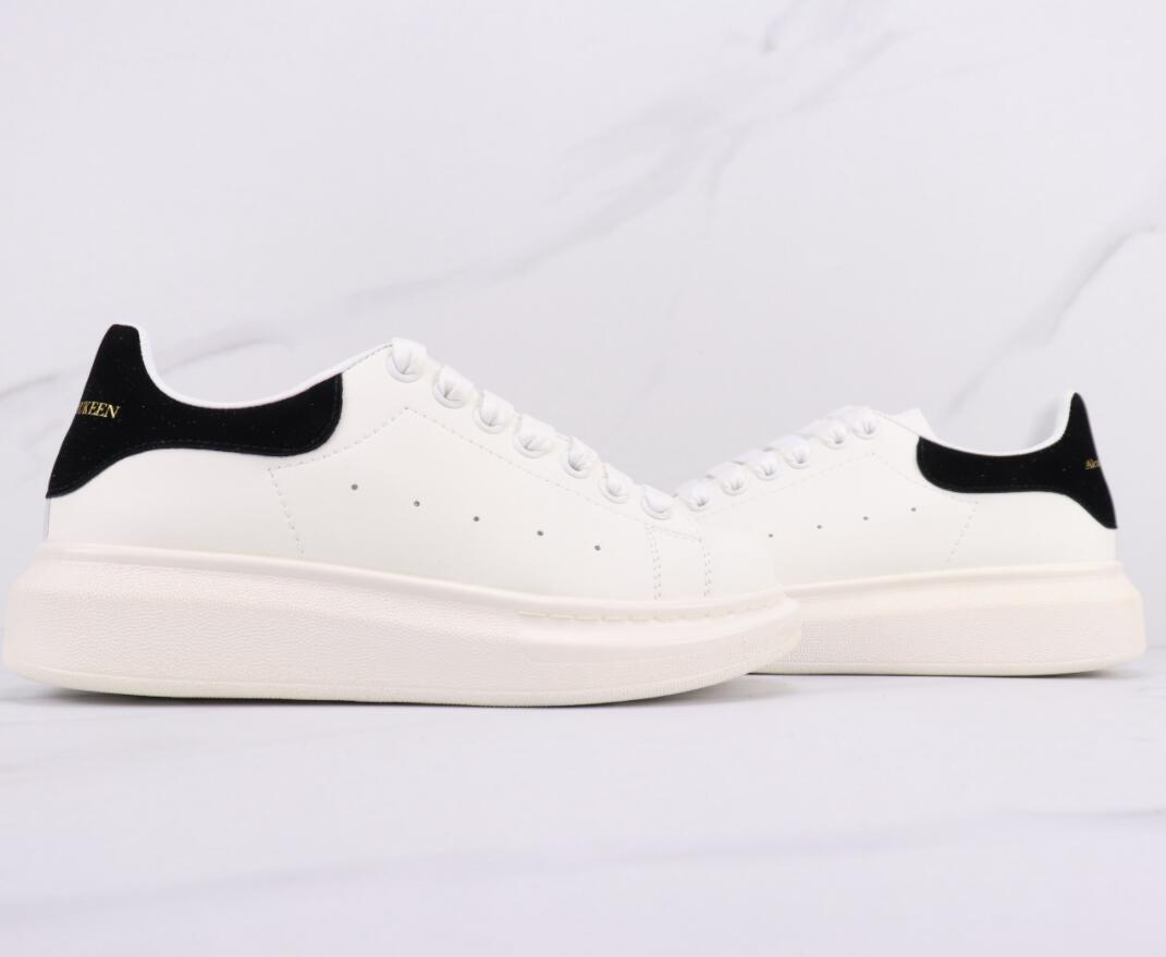 Alexander McQueen Low-Top Platform Sneakers: Sleek White Running Shoes with Signature Sole Design