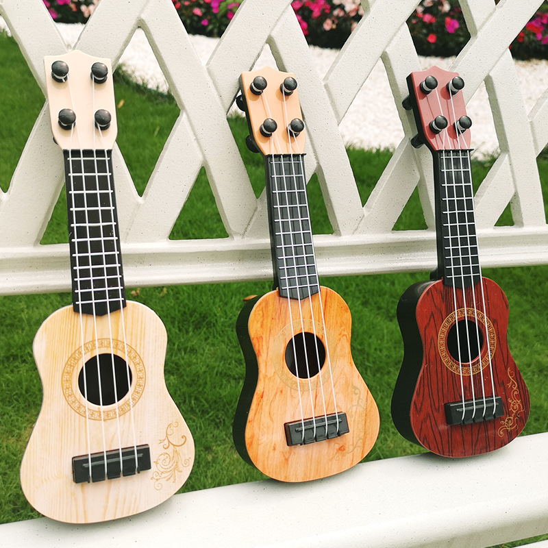 Yukrili toy children's small guitar model music enlightenment instrument guitar toy mini four string guitar