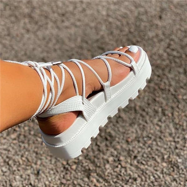 Women's shoes summer new bandage flat bottom net red ins tide solid color sponge cake thick bottom large size Roman shoes