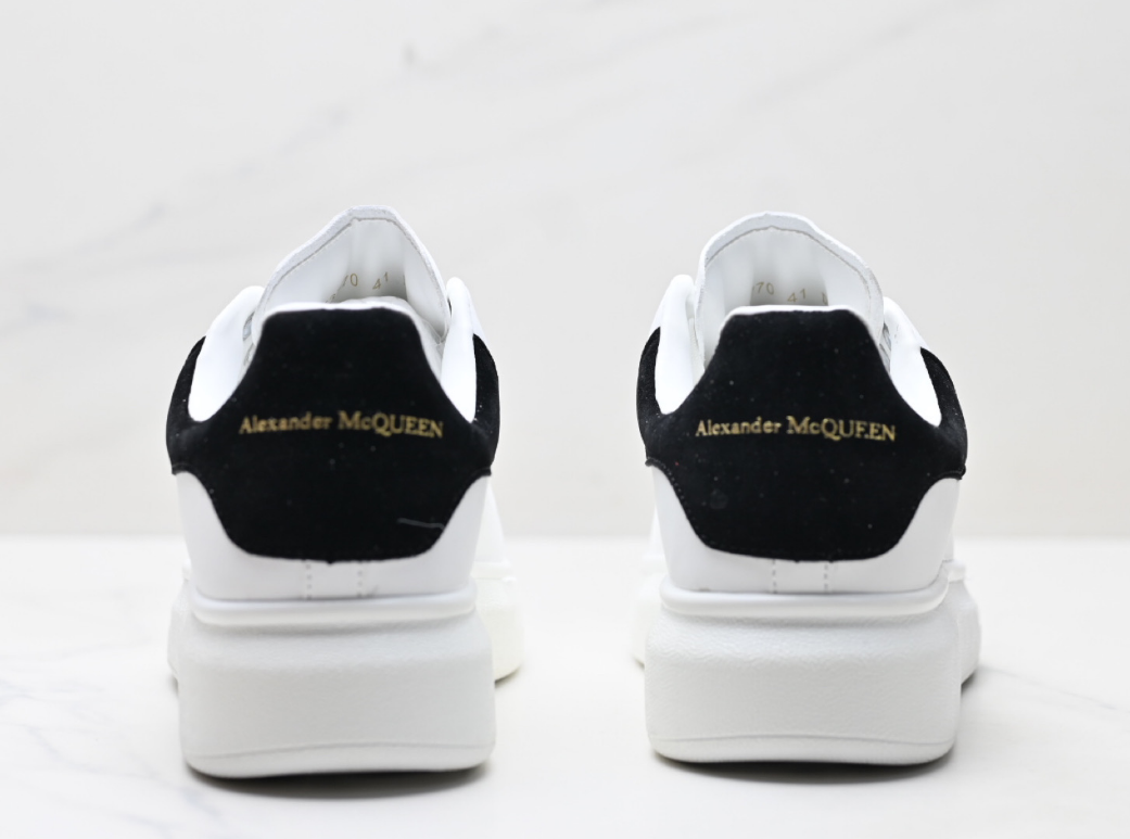 Alexander McQueen low-top casual sneakers in pure white made of sole leather