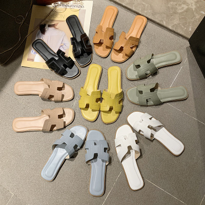 European station with the same type of H slippers summer flat heel