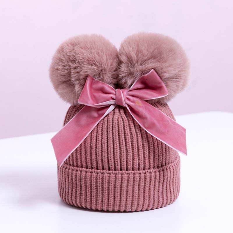 Korean version double fur ball bow cute knitted hat for boys and girls, autumn and winter with cotton thick warm baby hat