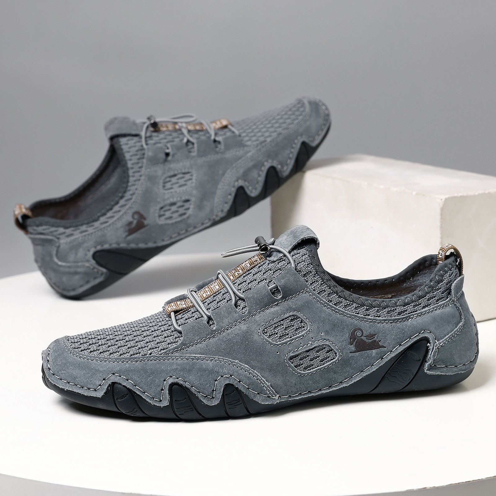 New breathable men's casual sports shoes large-sized sewn genuine leather mesh shoes Korean version trendy men's shoes
