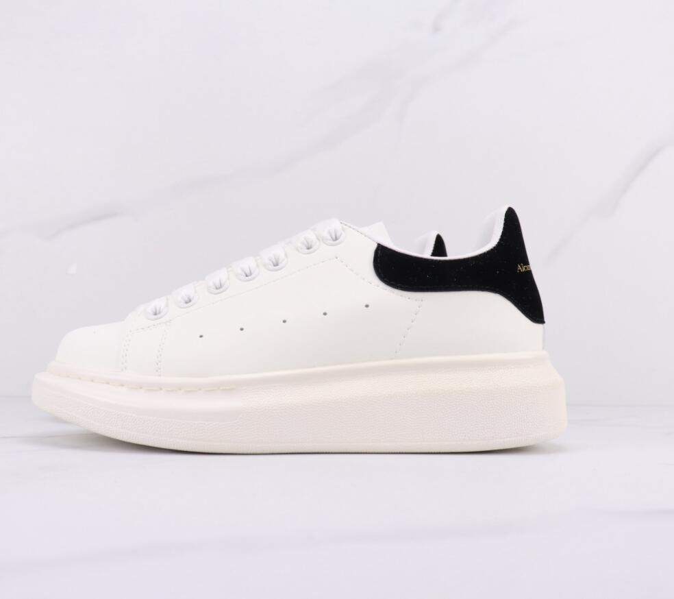 Alexander McQueen Low-Top Platform Sneakers: Sleek White Running Shoes with Signature Sole Design