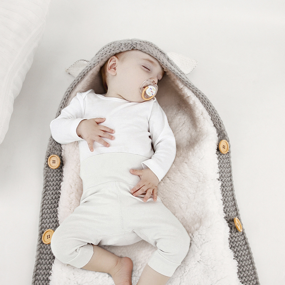 Autumn and winter baby stroller sleeping bag with knitted buttons and plush insulation Mini ear small tail sleeping bag