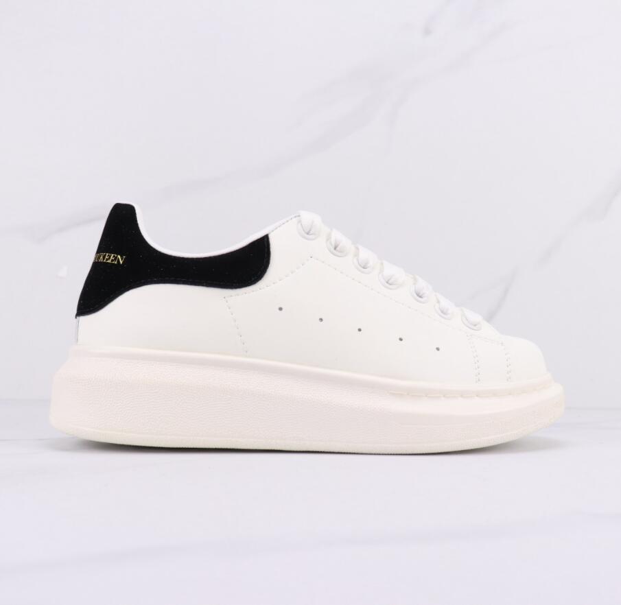 Alexander McQueen Low-Top Platform Sneakers: Sleek White Running Shoes with Signature Sole Design
