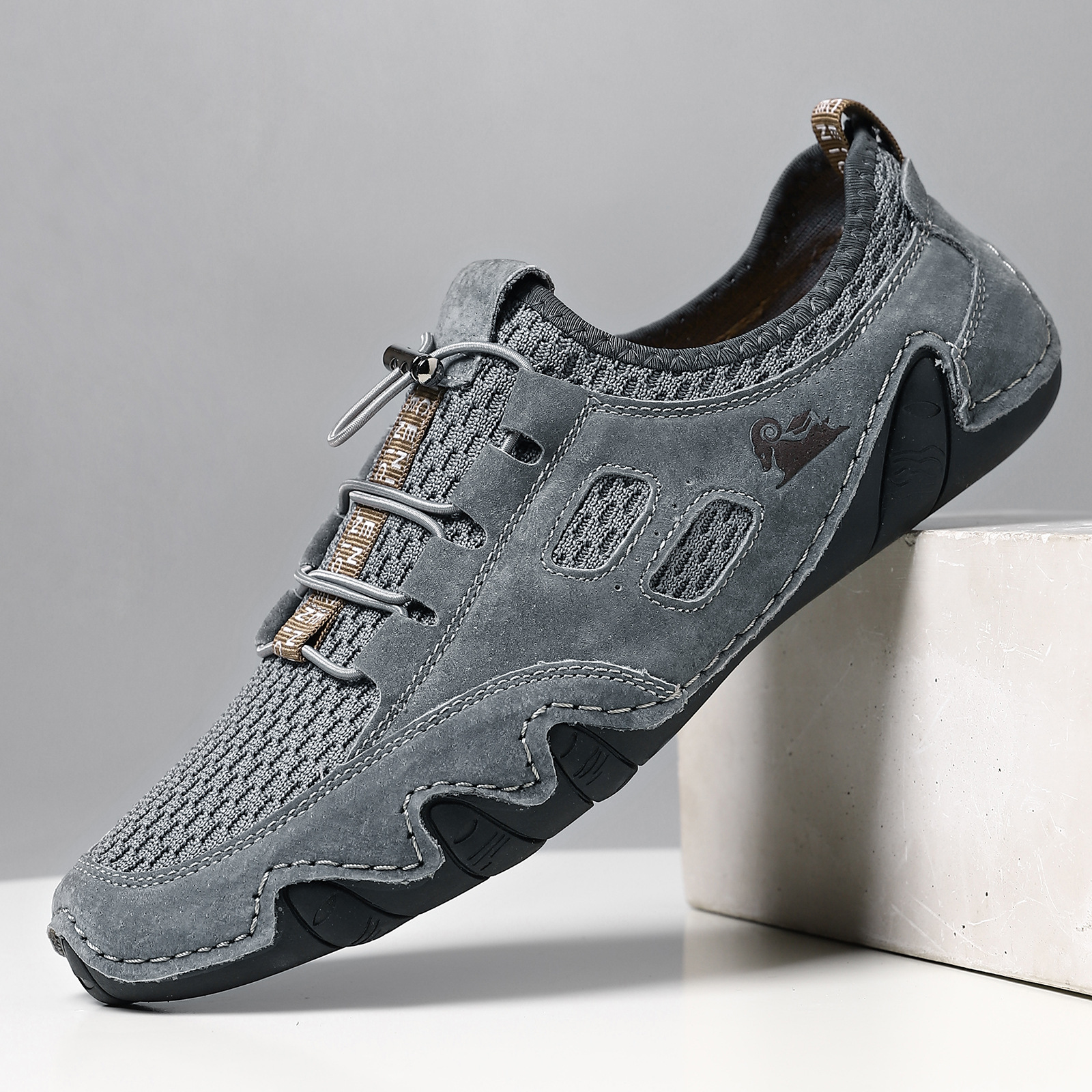 New breathable men's casual sports shoes large-sized sewn genuine leather mesh shoes Korean version trendy men's shoes