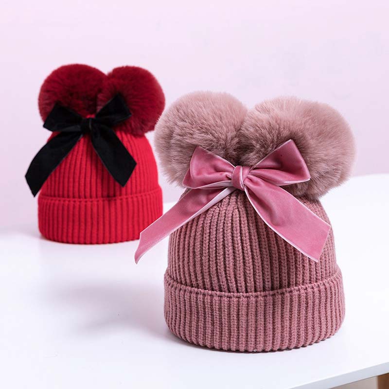 Korean version double fur ball bow cute knitted hat for boys and girls, autumn and winter with cotton thick warm baby hat