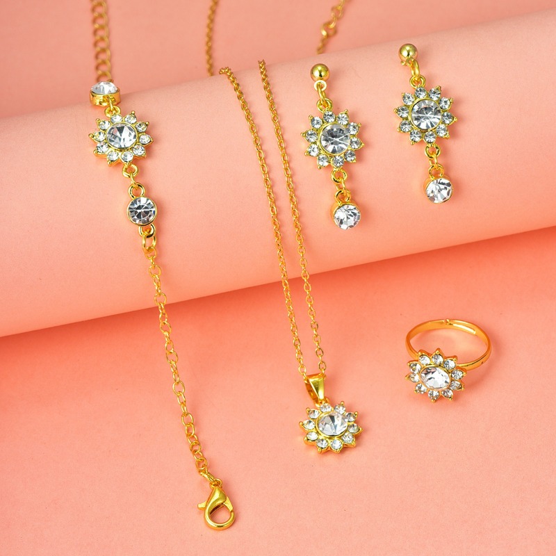 New Fashion Flower Diamond Set Zircon Necklace Earnail Ring Bracelet Jewelry Four Piece Set