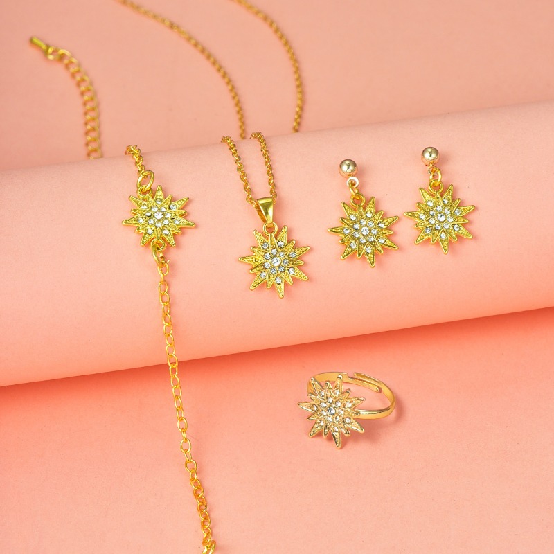 New Fashion Flower Diamond Set Zircon Necklace Earnail Ring Bracelet Jewelry Four Piece Set