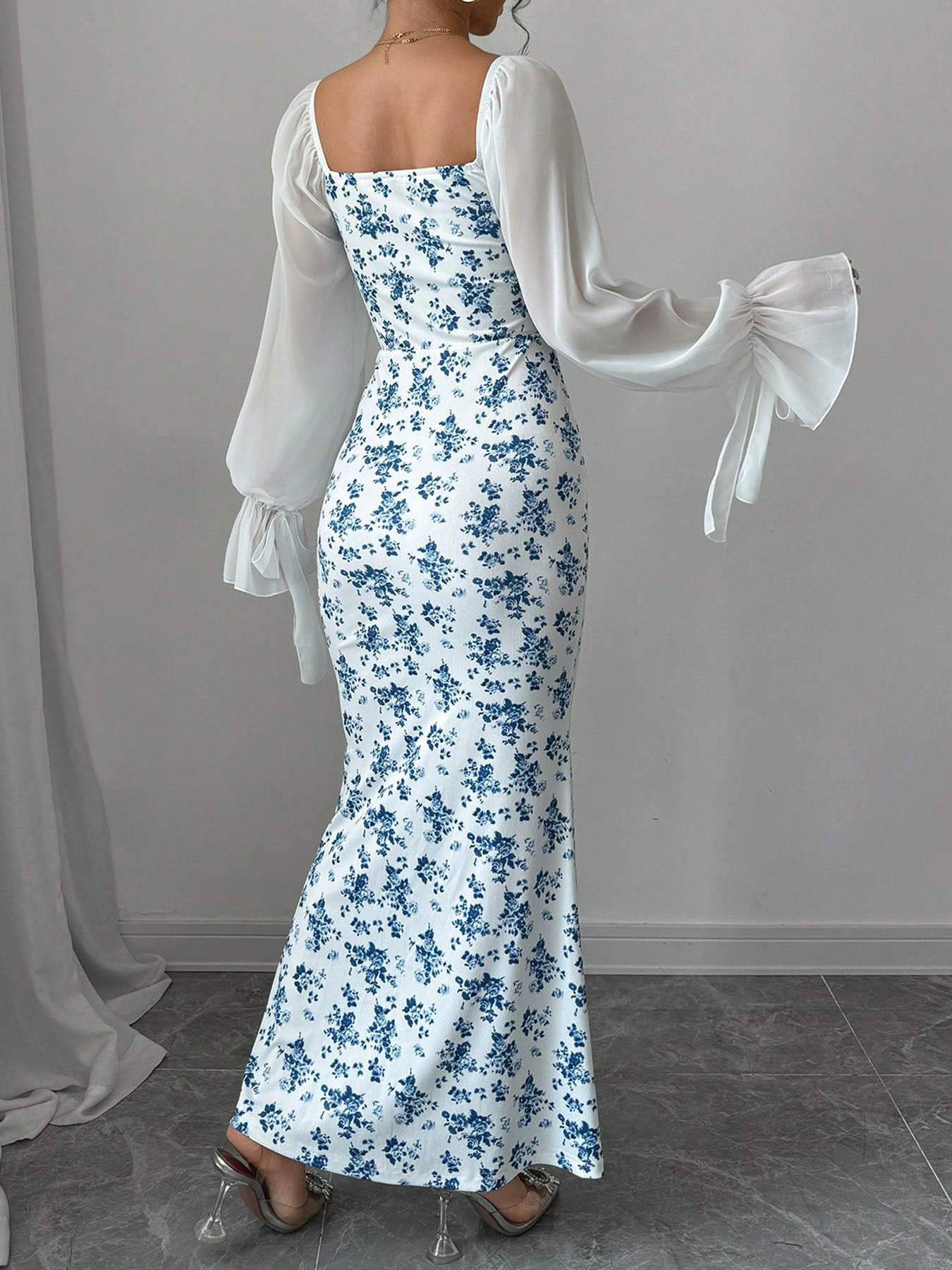 Women's long sleeved V-neck dress with chiffon splicing, knitted printing, bag buttocks long skirt