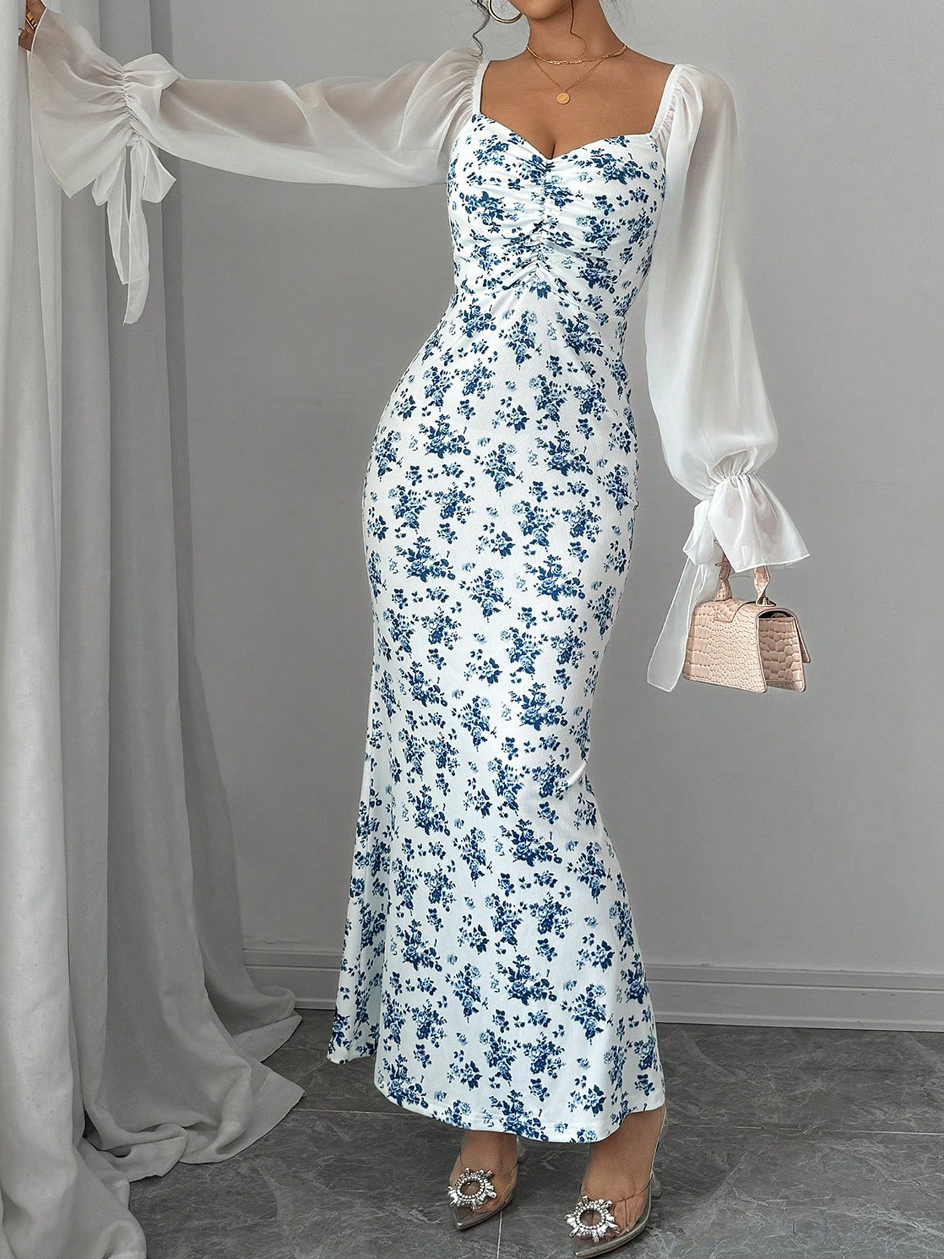 Women's long sleeved V-neck dress with chiffon splicing, knitted printing, bag buttocks long skirt