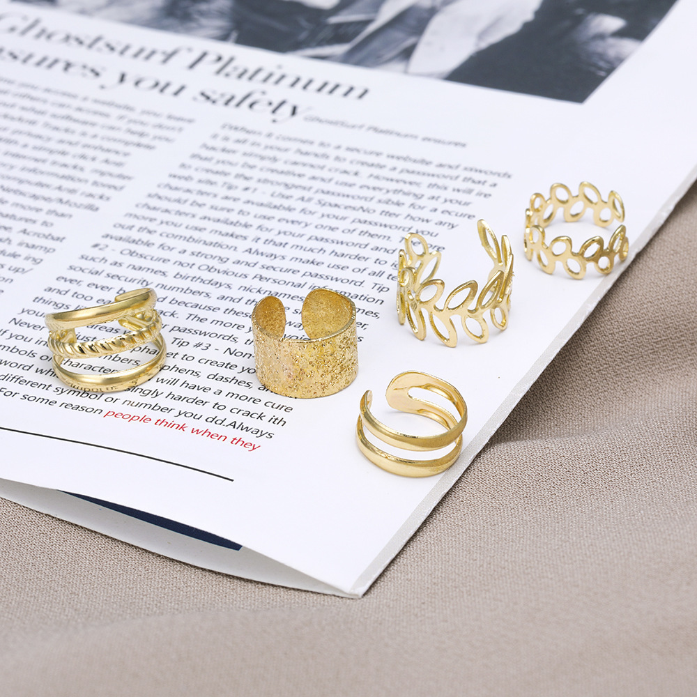 Creative simple no piercing ear bone clip five-piece personalized golden leaf hollow earrings C-shaped ear clip