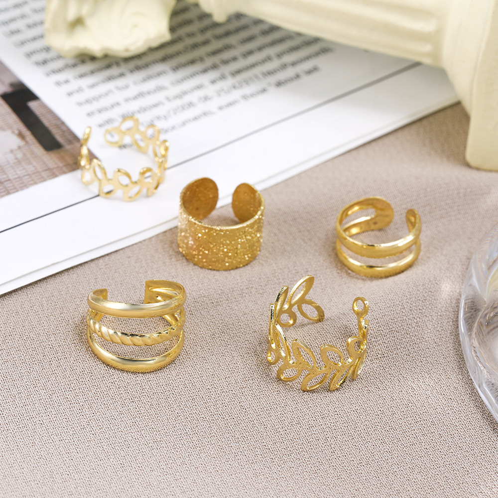 Creative simple no piercing ear bone clip five-piece personalized golden leaf hollow earrings C-shaped ear clip