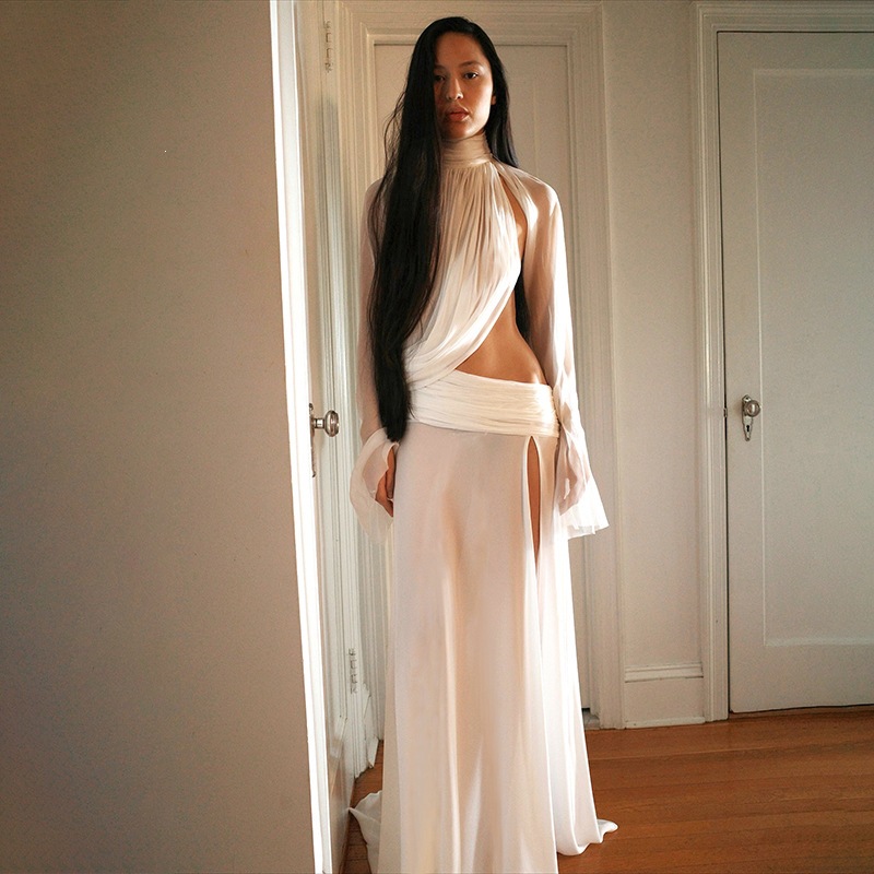 Free delivery of high-quality 2026 new summer women's clothing hot selling sexy high neck trumpet sleeve top slit long skirt set