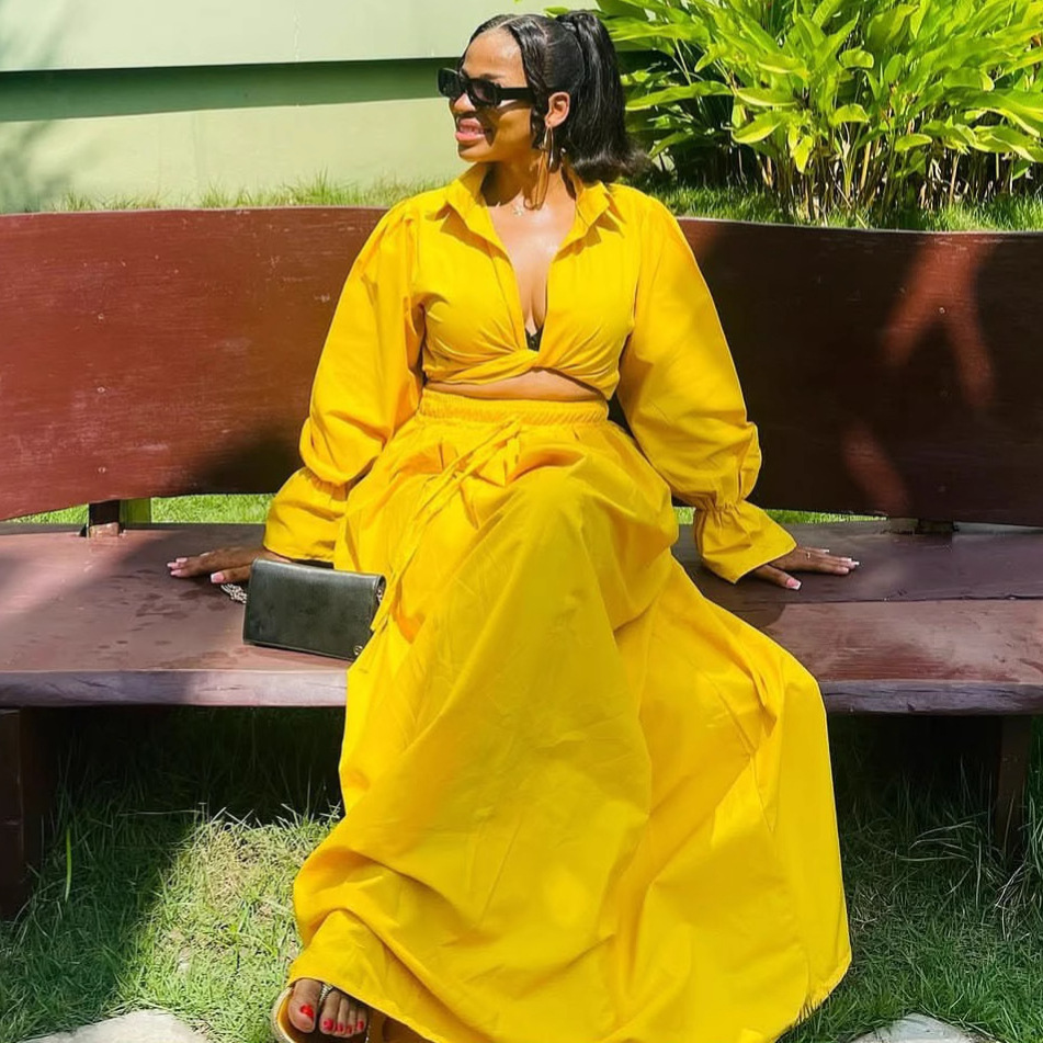 Free delivery of high-quality 2026 new summer women's clothing hot selling sexy lapel trumpet sleeve long skirt two-piece set