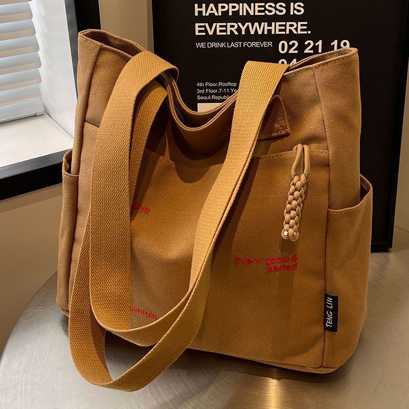Canvas bag women's men's new trendy embroidery letter handbag student large capacity single shoulder tote bag