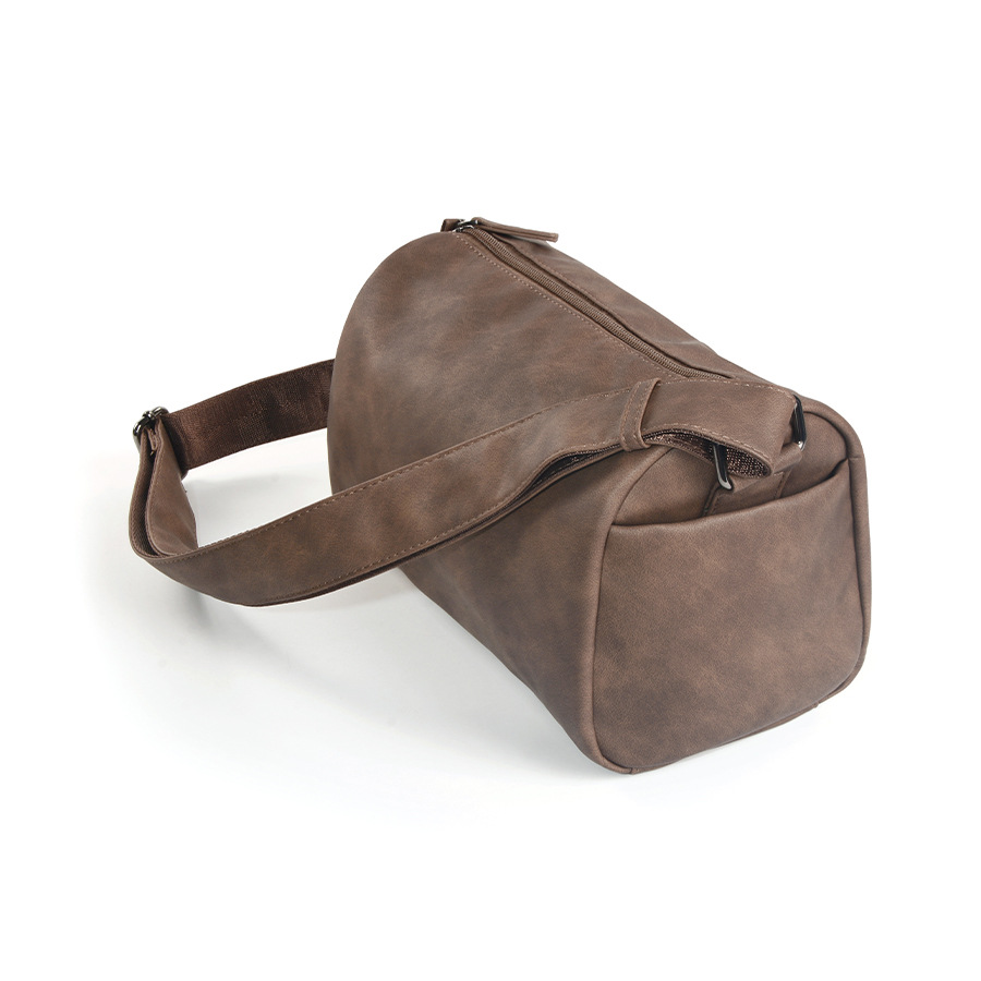 New cylindrical shoulder bag  fashionable and simple casual backpack  Korean version trendy men's bag  diagonal cross bag