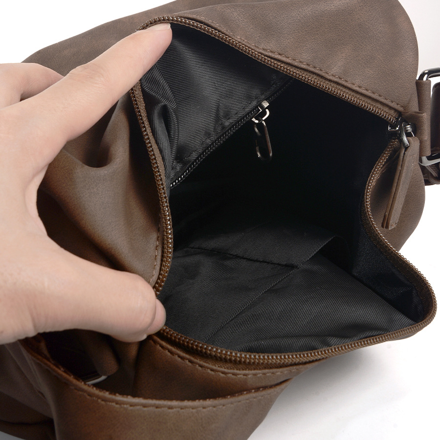 New cylindrical shoulder bag  fashionable and simple casual backpack  Korean version trendy men's bag  diagonal cross bag