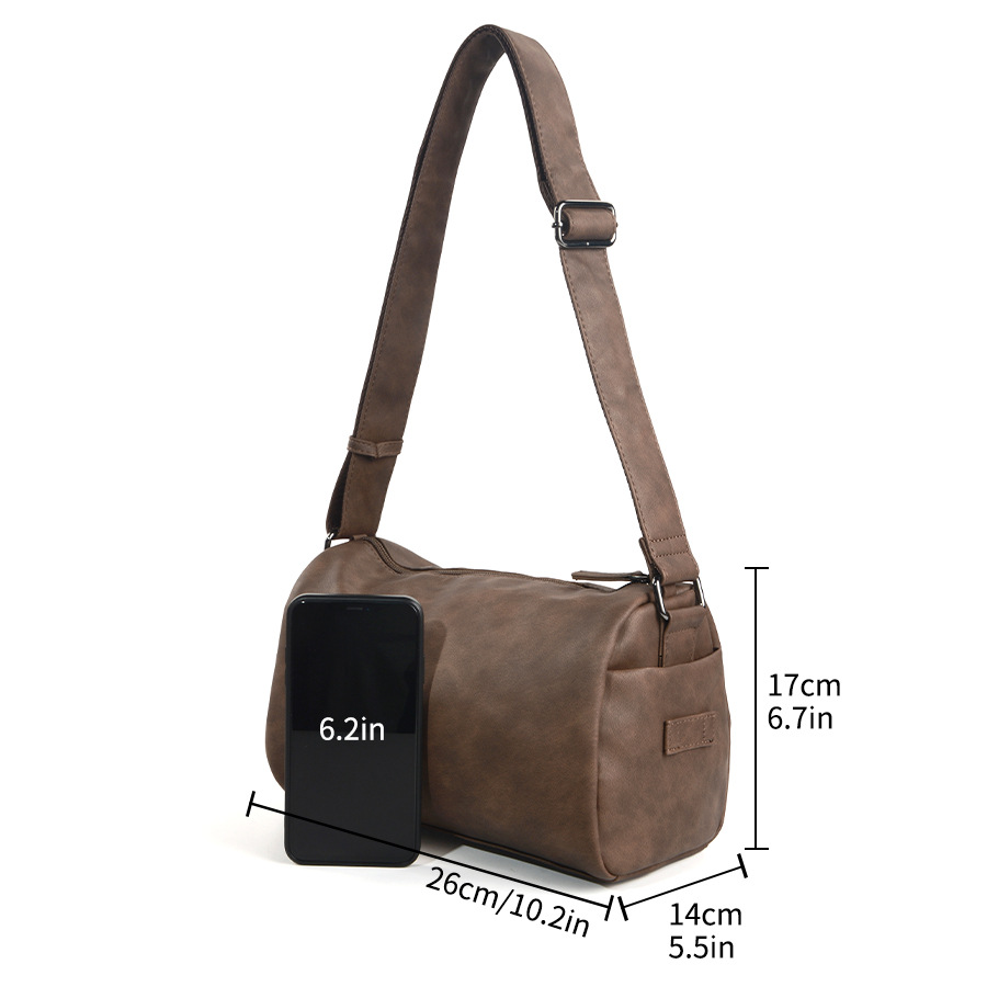 New cylindrical shoulder bag  fashionable and simple casual backpack  Korean version trendy men's bag  diagonal cross bag