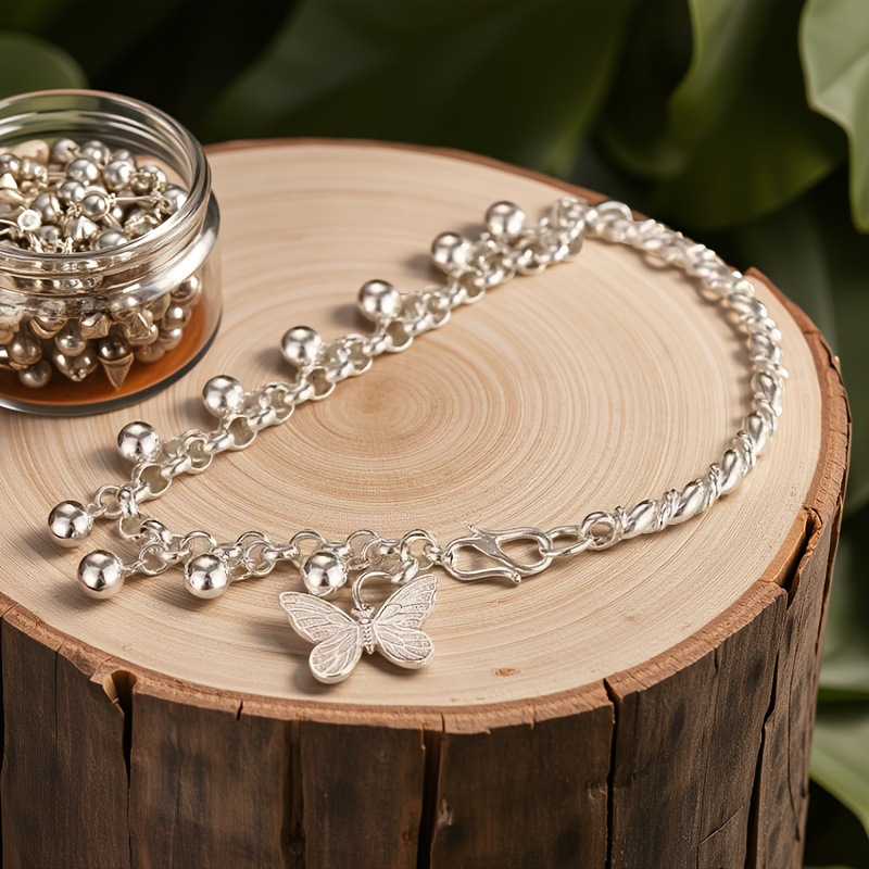 Whimsical Butterfly Charm Bracelet – Dynamic Bell Accents, Soft Chime, and Timeless Retro Sweetness