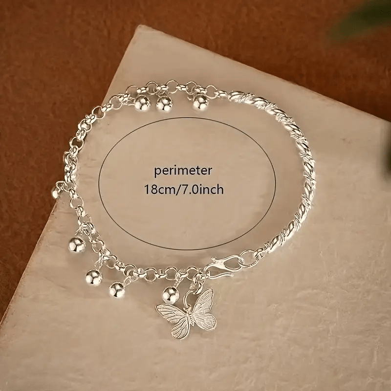 Whimsical Butterfly Charm Bracelet – Dynamic Bell Accents, Soft Chime, and Timeless Retro Sweetness