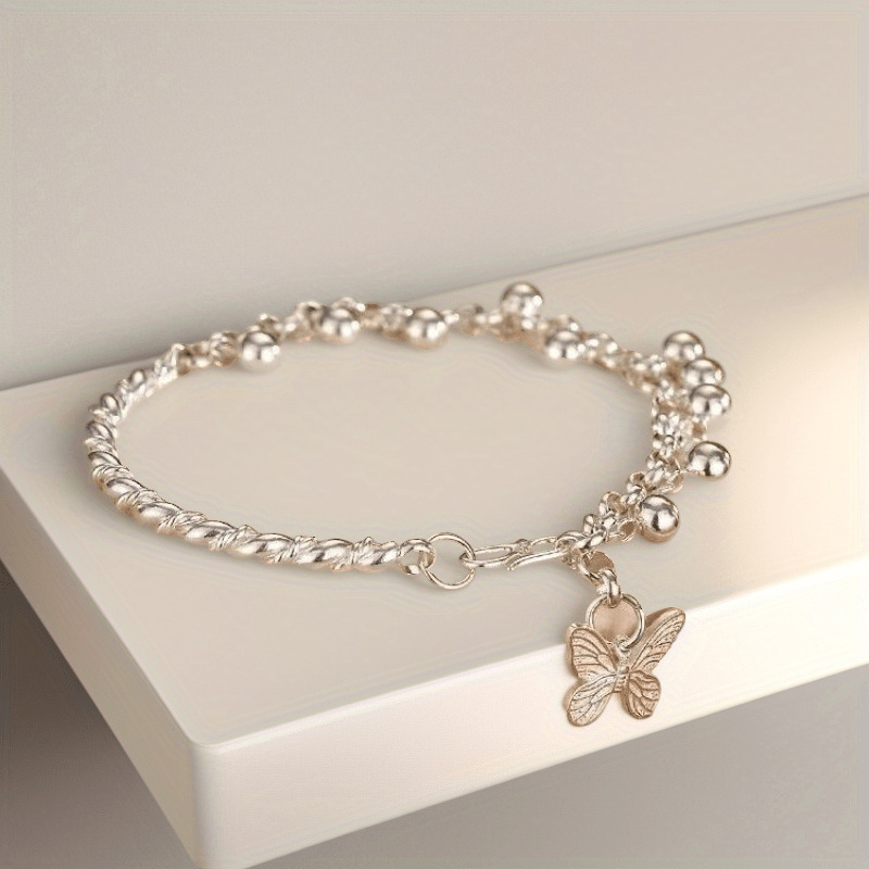 Whimsical Butterfly Charm Bracelet – Dynamic Bell Accents, Soft Chime, and Timeless Retro Sweetness
