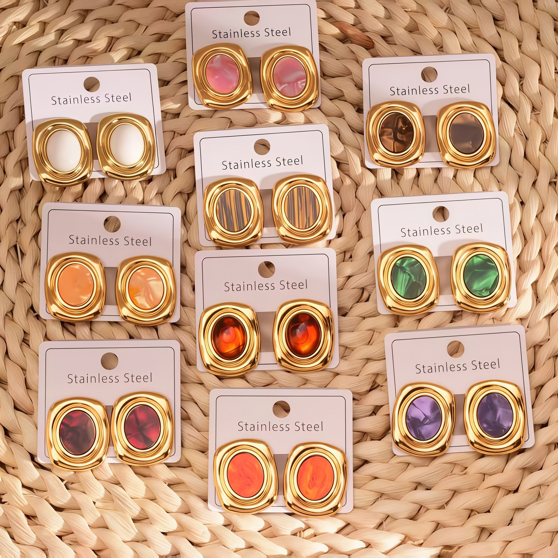 New cat eye gemstone earrings with high-end feel, stainless steel natural stone, sunflower vacuum plated fashionable earrings