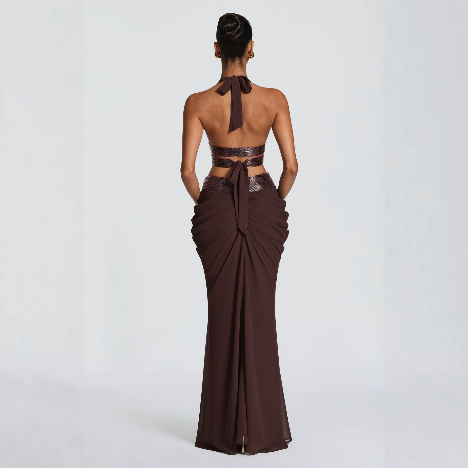 Free delivery of high-quality 2026 new summer women's clothing hot selling hanging neck deep V-strap sexy strap half skirt set
